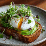 Izzio Sourdough Bread Review: 5 Honest Truths You Need To Know 6 Toasted Izzio sourdough topped with avocado, poached egg, and microgreens