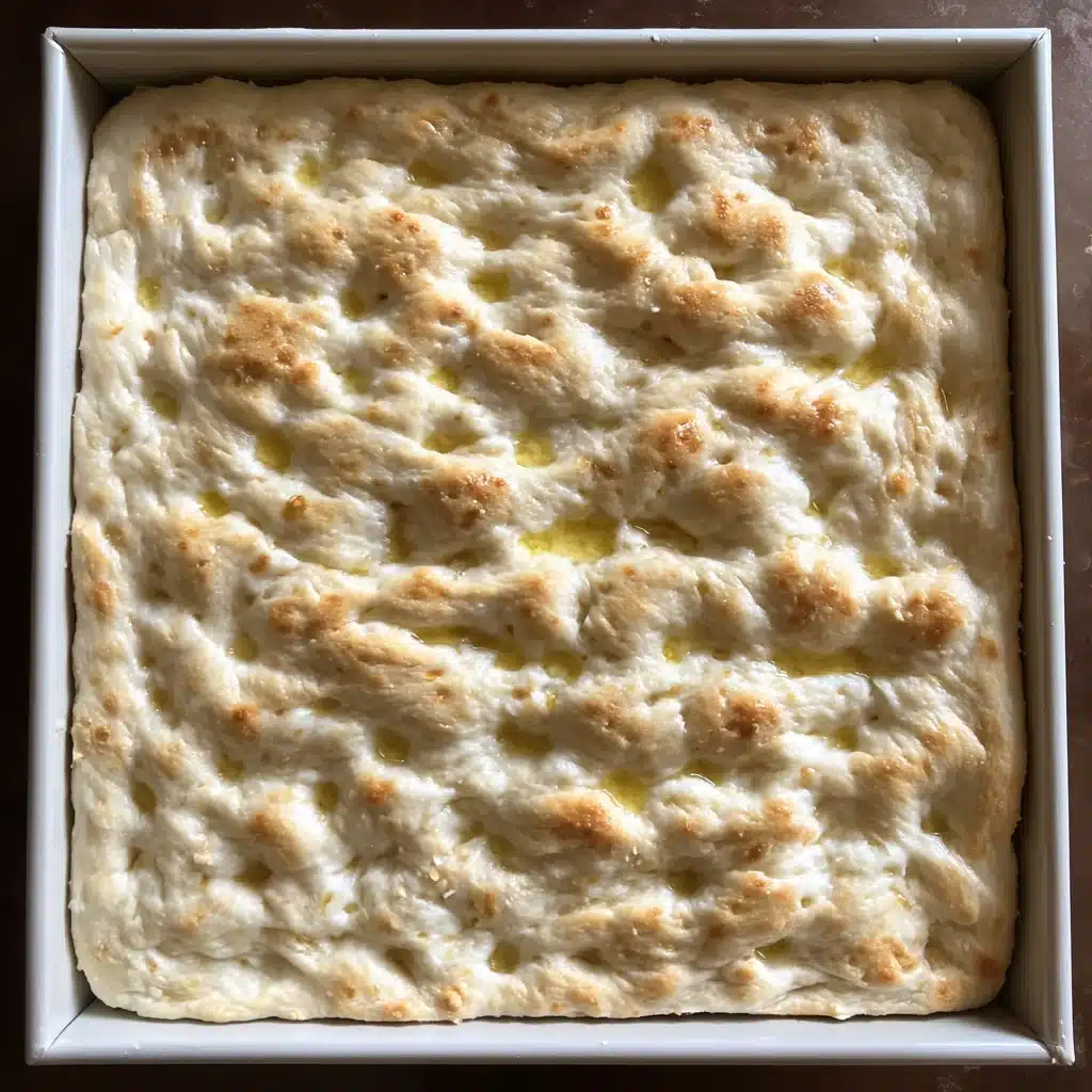 Sourdough Focaccia Recipe – 7 Steps to Crisp, Golden, Perfect Bread 8 focaccia dough dimpling in pan