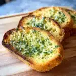 Sourdough Garlic Toast Recipe: 5 Bold Twists You’ll Crave 6 sourdough garlic toast on rustic board