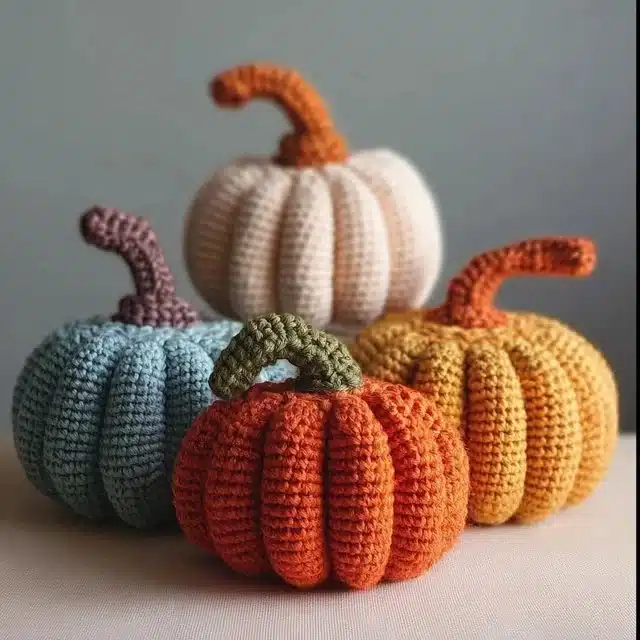 How to Make a Quick & Easy Crochet Pumpkin – Free Pattern 1 Handmade crochet pumpkin in autumn colors, showcasing the free crochet pattern.