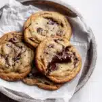 Banana Bread Cookies: 10 Deliciously Soft Treats to Warm Your Heart 4 Freshly baked banana bread cookies on a tray.