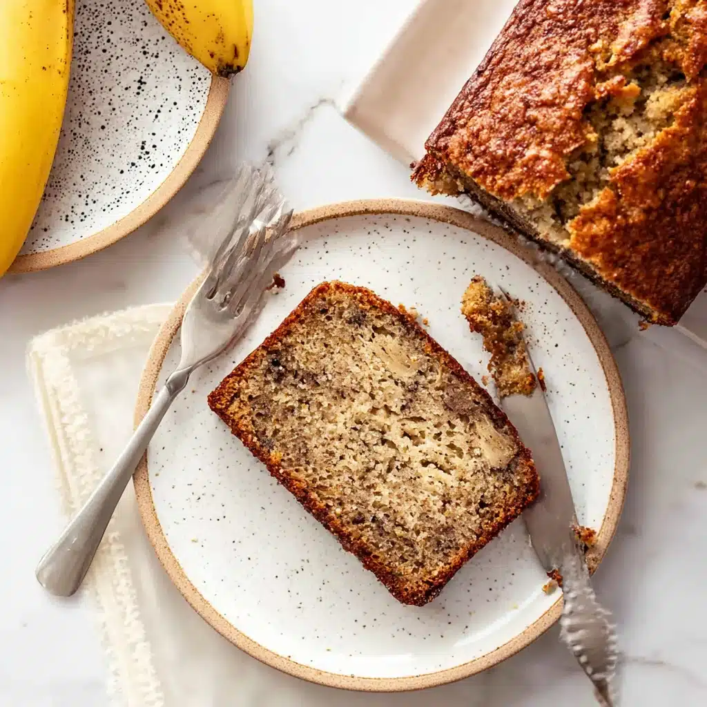 Banana Bread: 5 Easy Steps for Moist, Fluffy Results 5 Slice of banana bread with butter and coffee on a cozy kitchen table