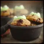 Cauldron Cookies , 7 Enchanting Reasons You’ll Love This Savory Treat 6 Freshly baked Cauldron Cookies on a rustic plate