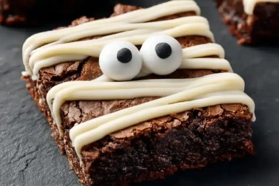 Easy Halloween Mummy Brownies with cream cheese frosting decorated for spooky fun