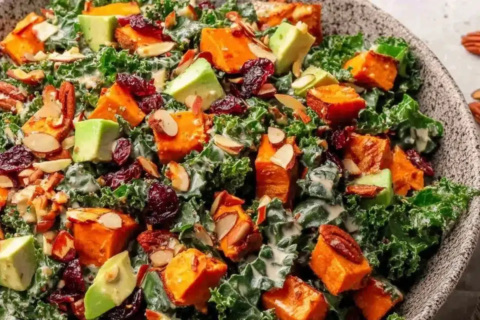 Easy fall harvest salad with sweet potatoes, kale, and seasonal ingredients.