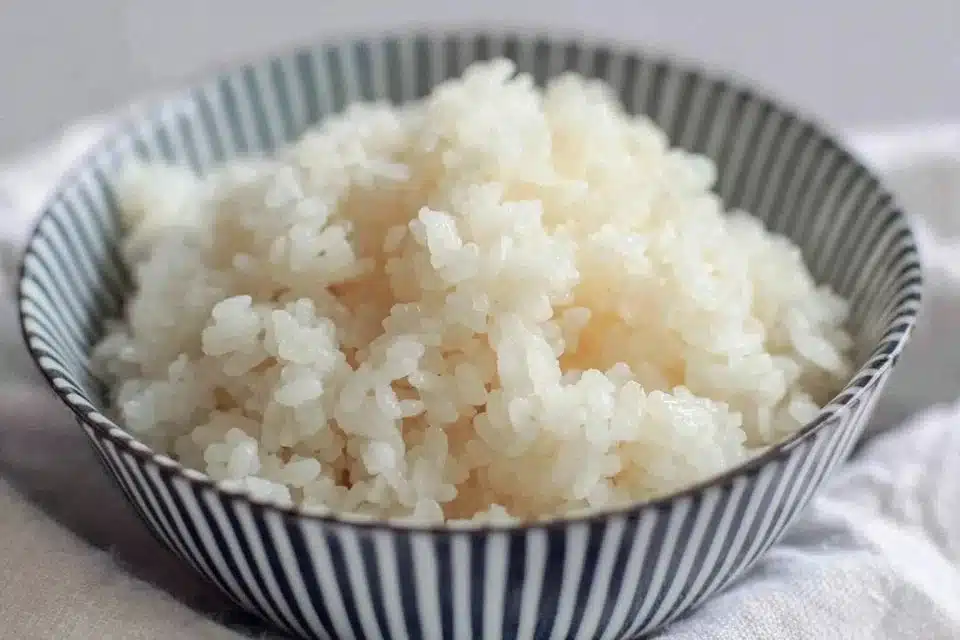 Bowl of perfectly cooked sushi rice ready for making sushi rolls