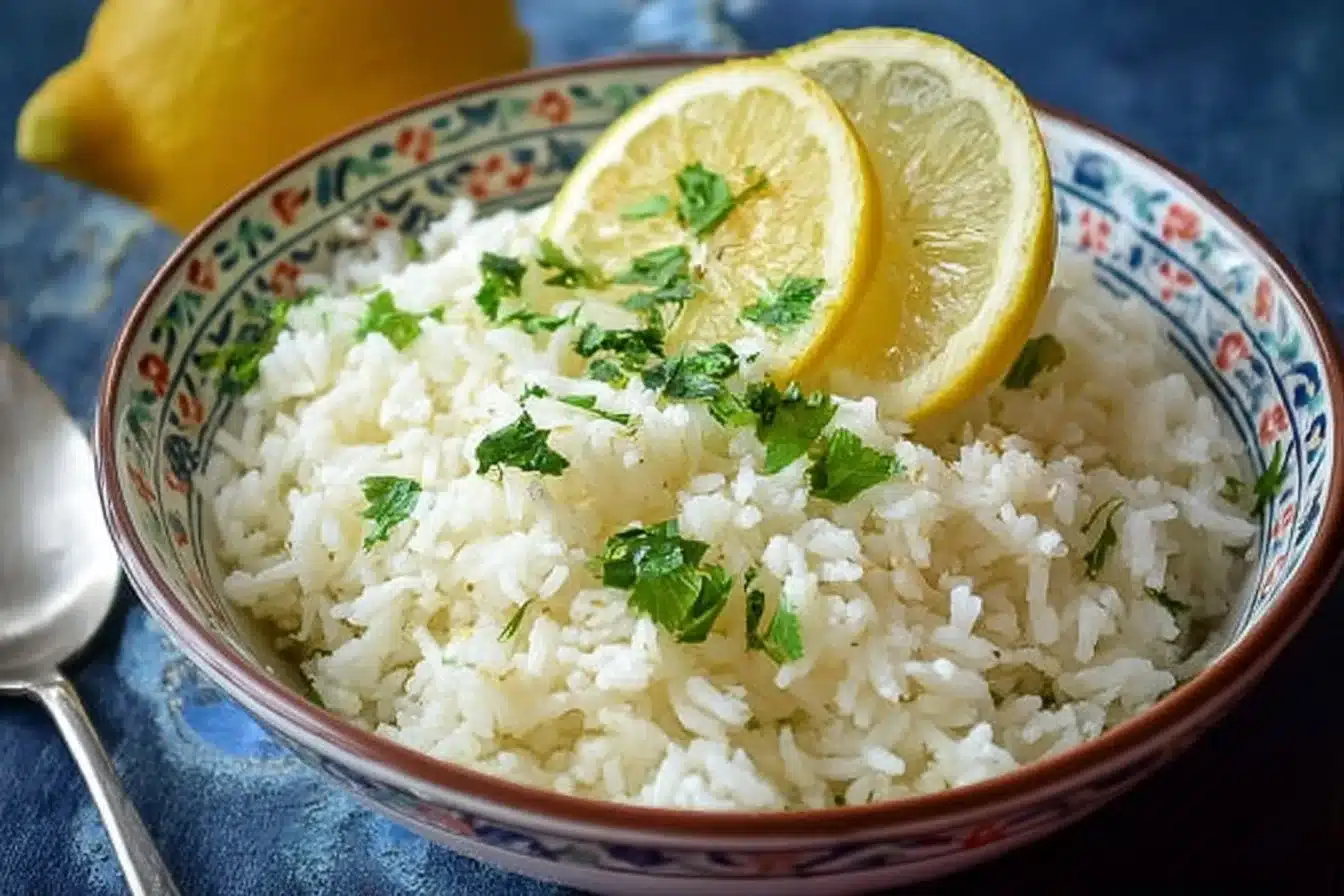 Delicious Greek Lemon Rice served in a bowl garnished with herbs