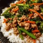 Ground turkey teriyaki stir fry with colorful vegetables in a skillet.