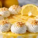 Delicious slice of Italian Lemon Cream Cake with lemon zest and creamy frosting