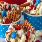 Colorful 4th of July candy snack mix with red, white, and blue treats.