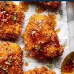 Delicious crispy hot honey chicken with a sweet and spicy glaze.