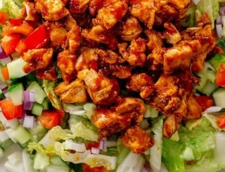 Spicy Honey Chicken Salad Recipe 3 Delicious spicy honey chicken salad in a bowl with vibrant vegetables